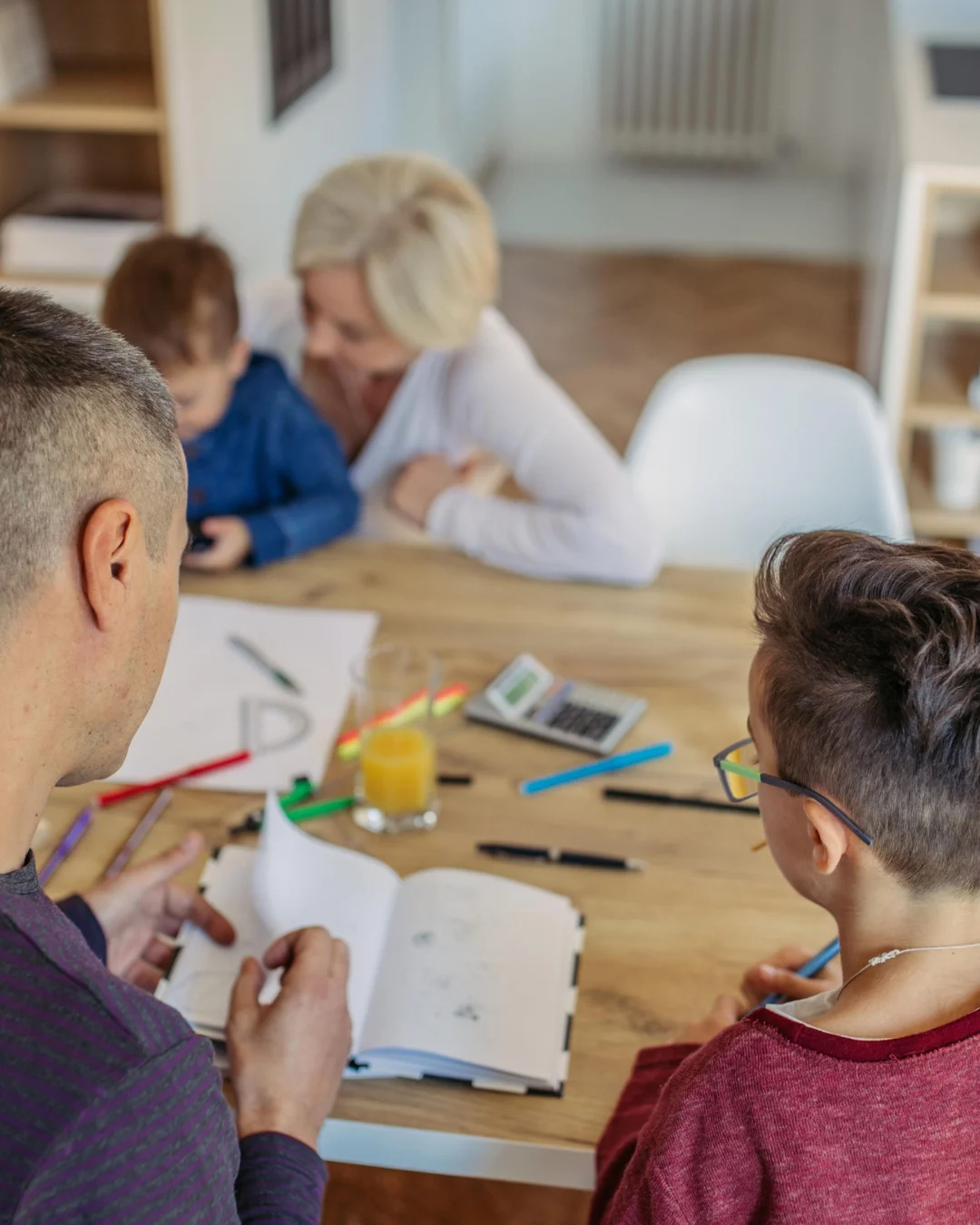 Family learning together in a warm home setting
